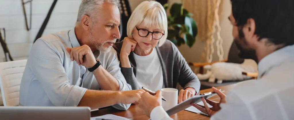 Financial advisor explaining paperwork