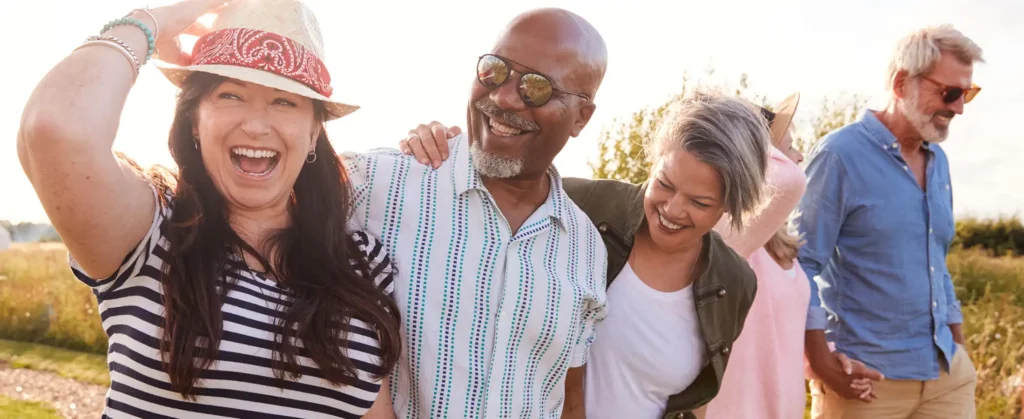 Group Of Mature Friends On Vacation Walking